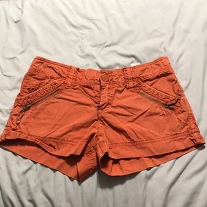 American Eagle orange shorts
